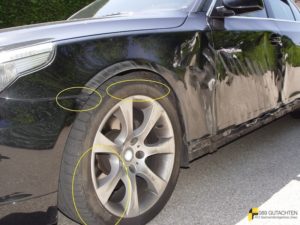 BMW Seitenschaden Baumaschine Fahrerseite Rad Detail